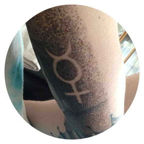 mercury symbol tattoo